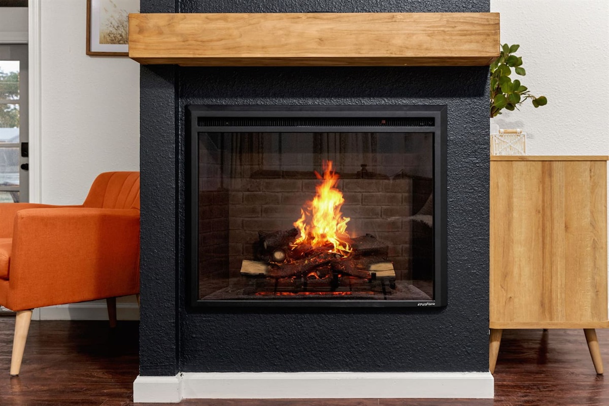 Enjoy the ambience and warmth of the electric fireplace 