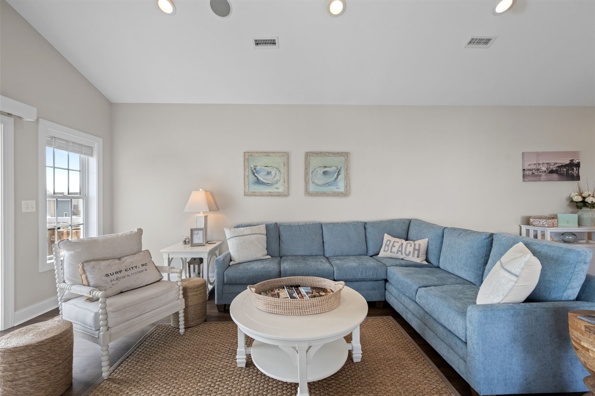 Sink into relaxation, surrounded by the soothing embrace of coastal vibes.