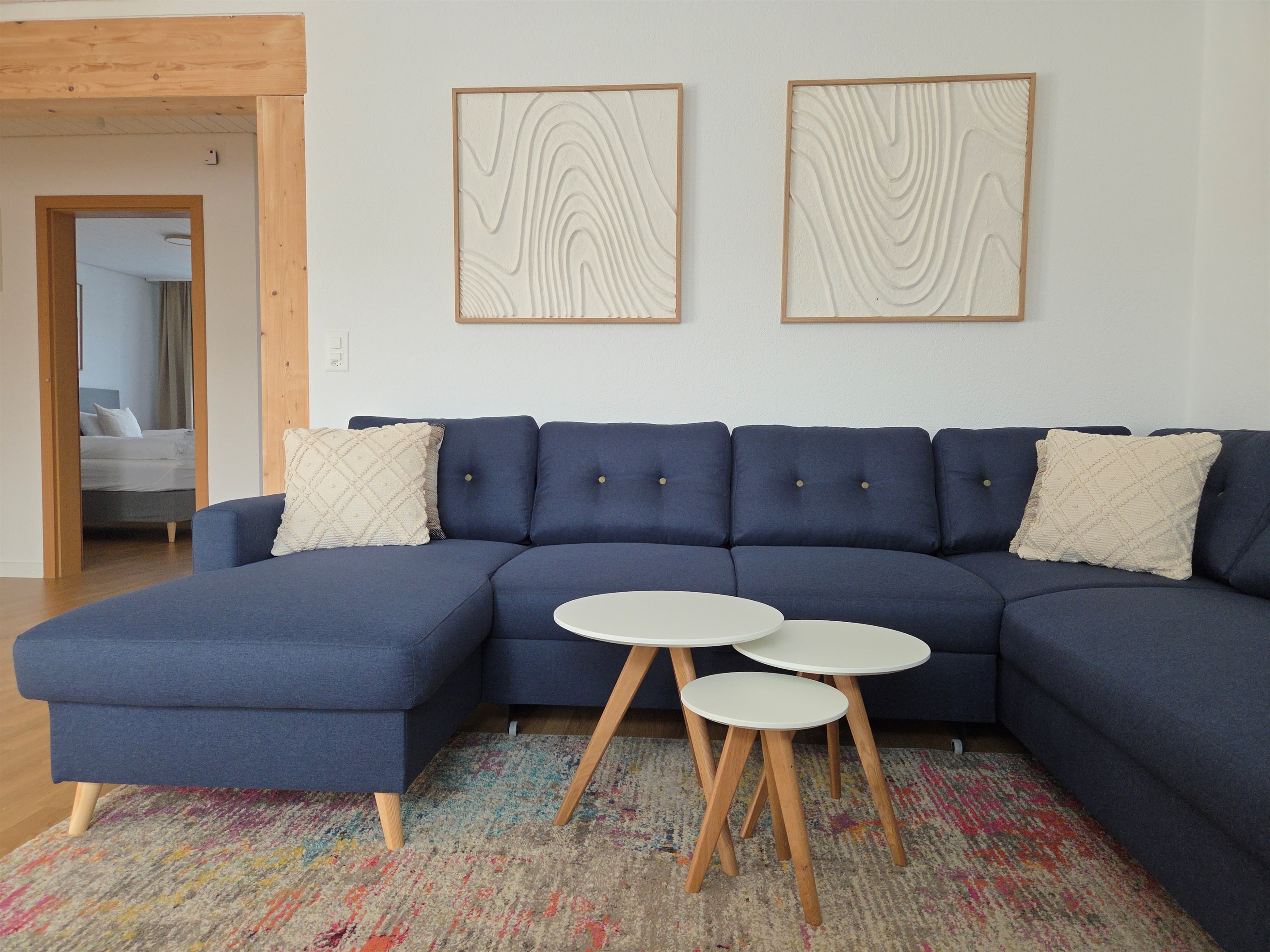 Living room with large couch / sofa bed