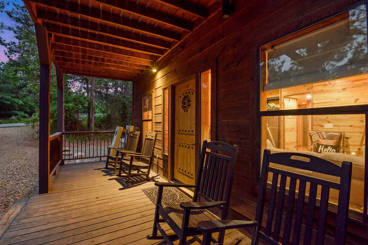 Front Porch: Relax in rocking chairs while soaking up nature’s beauty at sunset!