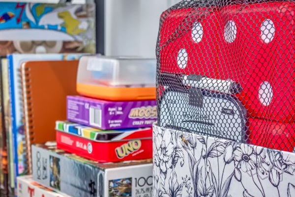 Sunrise cottage - offers plenty of indoor fun with a dedicated shelf stocked with board games, puzzles, and family activities—ideal for snowy nights in.