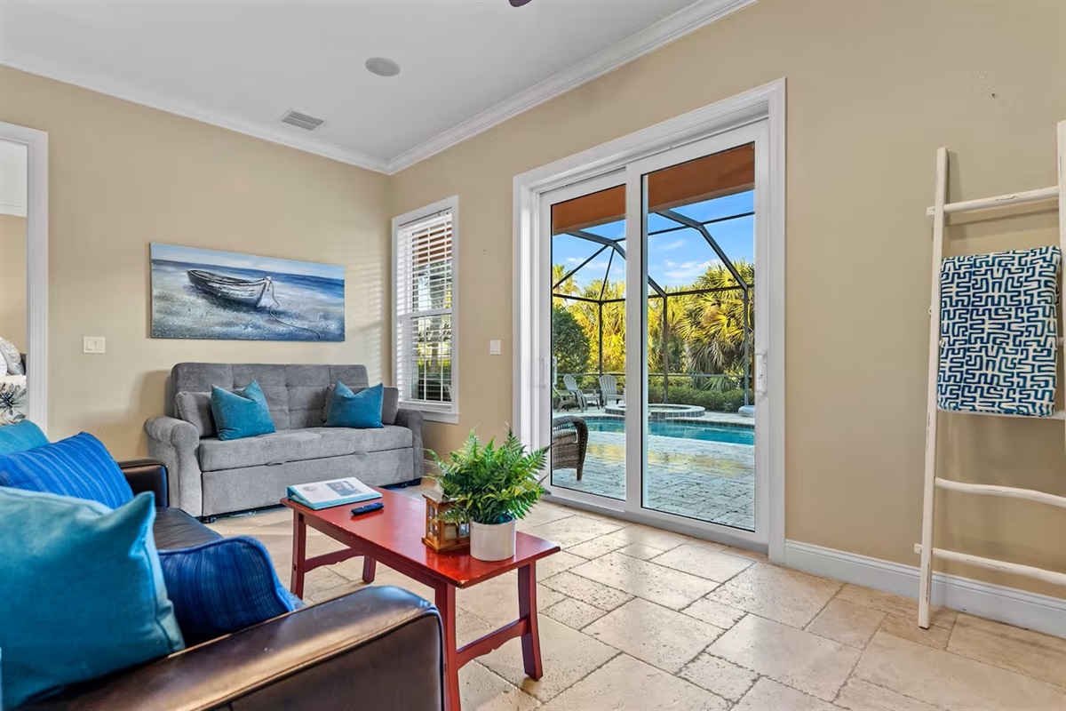 Indoor–outdoor living made easy 🌴
Step from the living room straight to your private screened pool and spa—perfect for effortless lounging, fresh air, and sunny Florida days.
