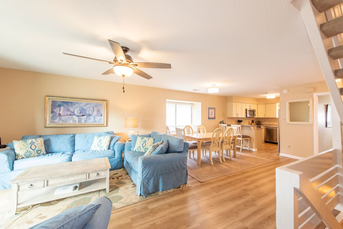 Settle into the main level after a long beach day &mdash; open layout, coastal touches throughout, and the kind of living space that fits nine people without anyone feeling crowded.