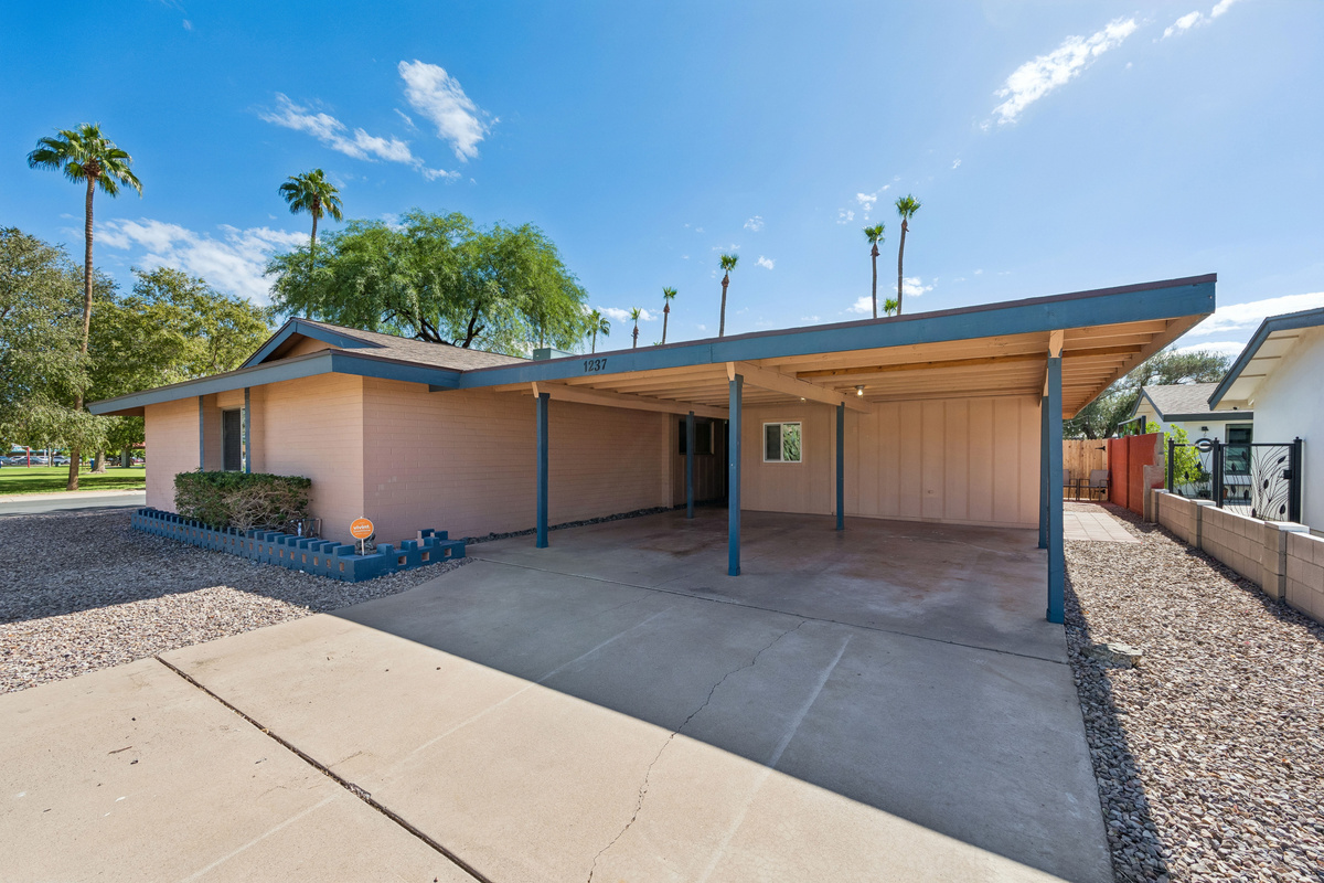 Your covered parking spot is on the right side of this carport.  There's also plenty of space to park on the street.