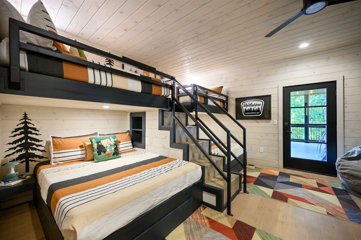 The bunk room has direct access to the hot tub deck.