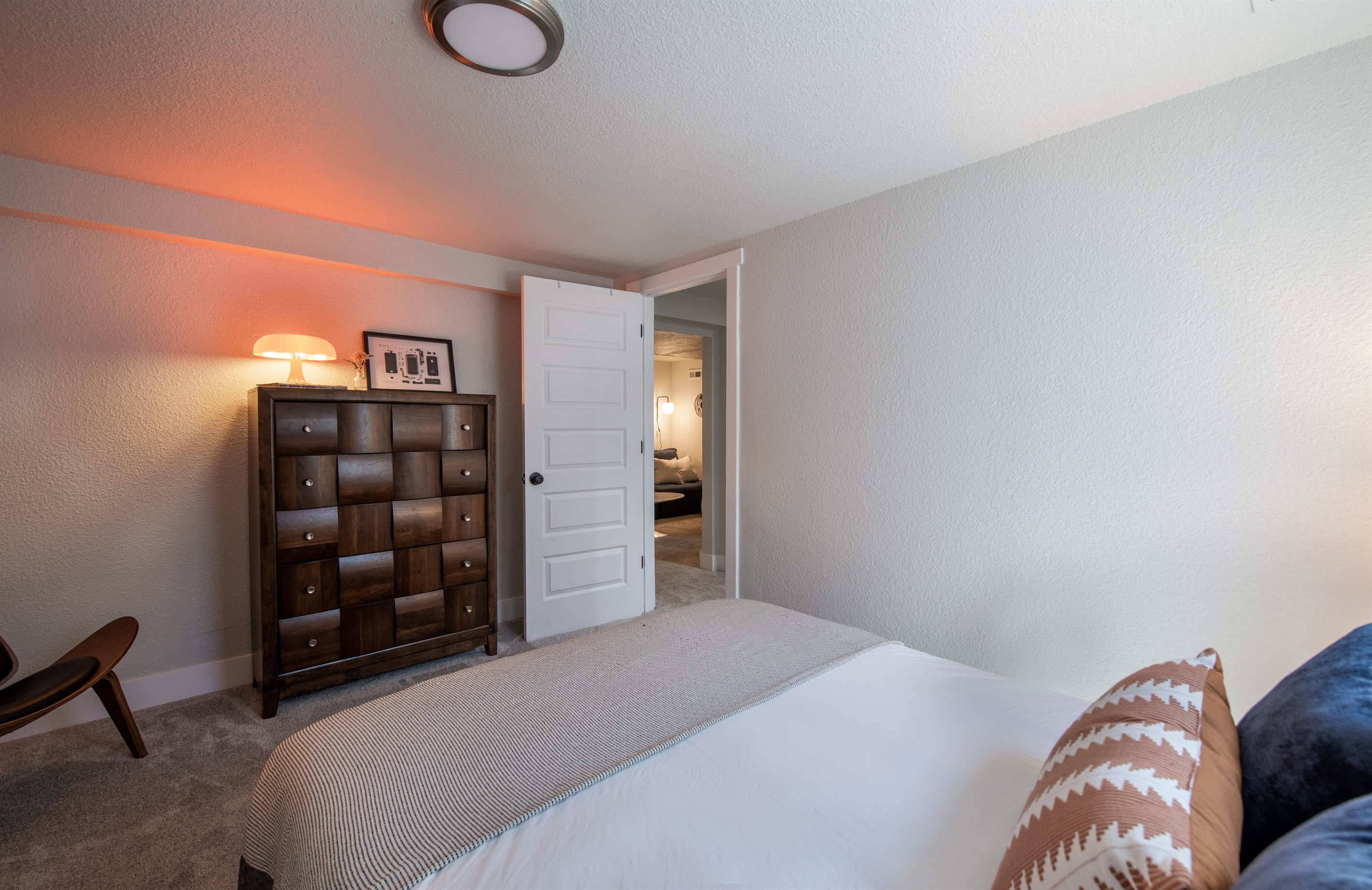 View from window of bedroom 3 into the lower level and movie theater room.