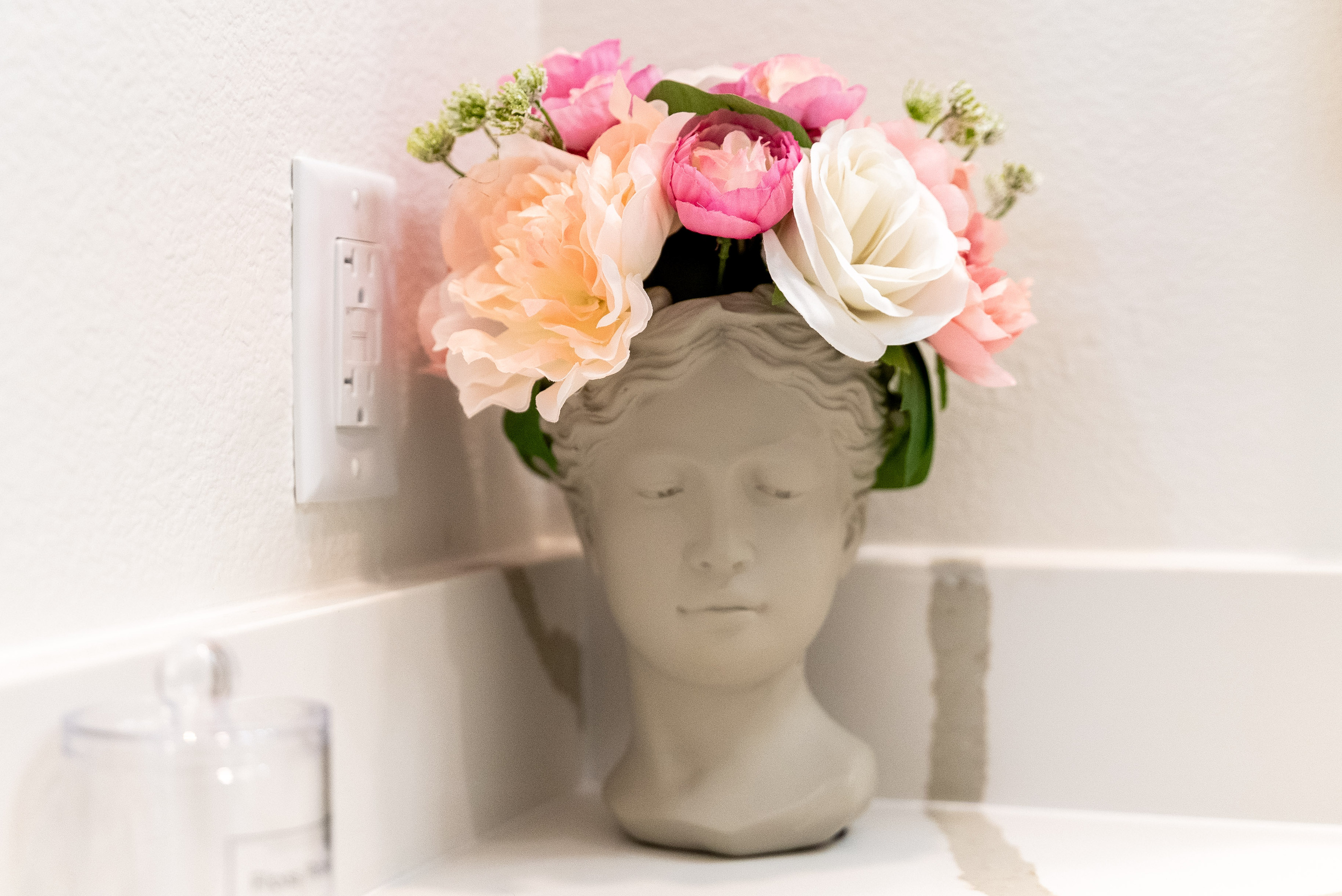 Whimsical floral accents bring charm and character to every corner.