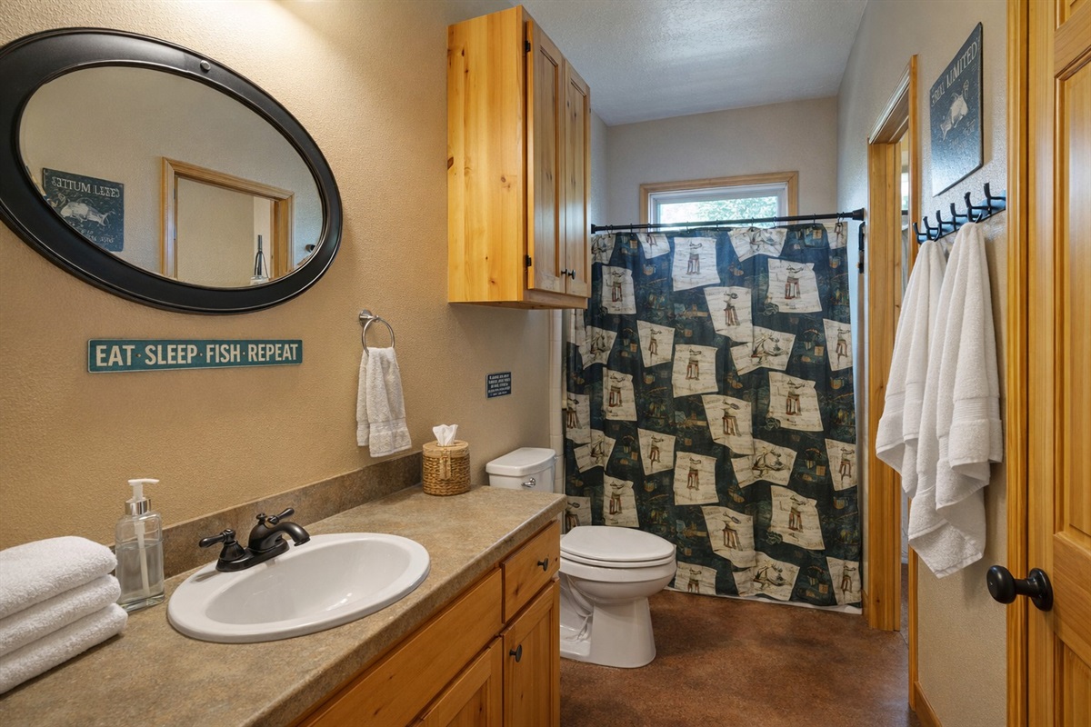 Second full bathroom with tub/shower combo — accessible from bedroom & hall.
