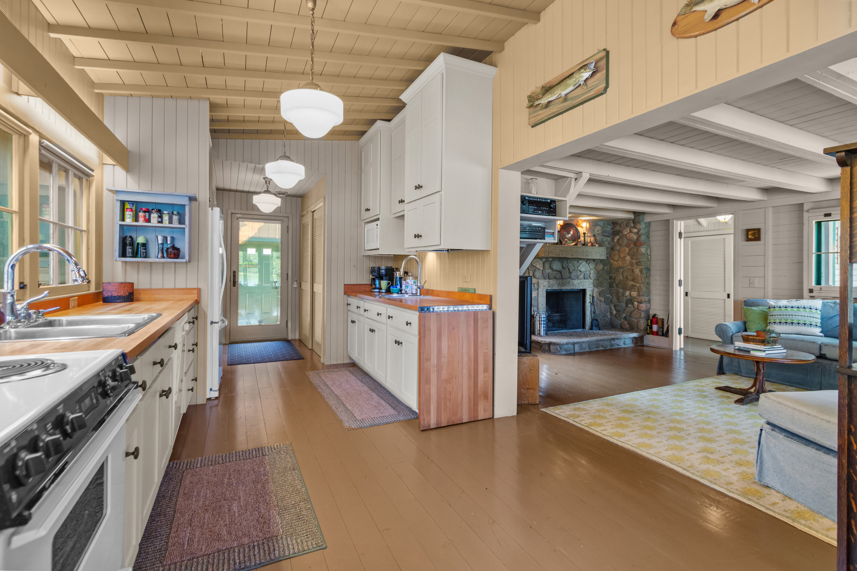The open layout keeps everyone connected, whether you’re preparing a meal in the kitchen or relaxing together in the living room.