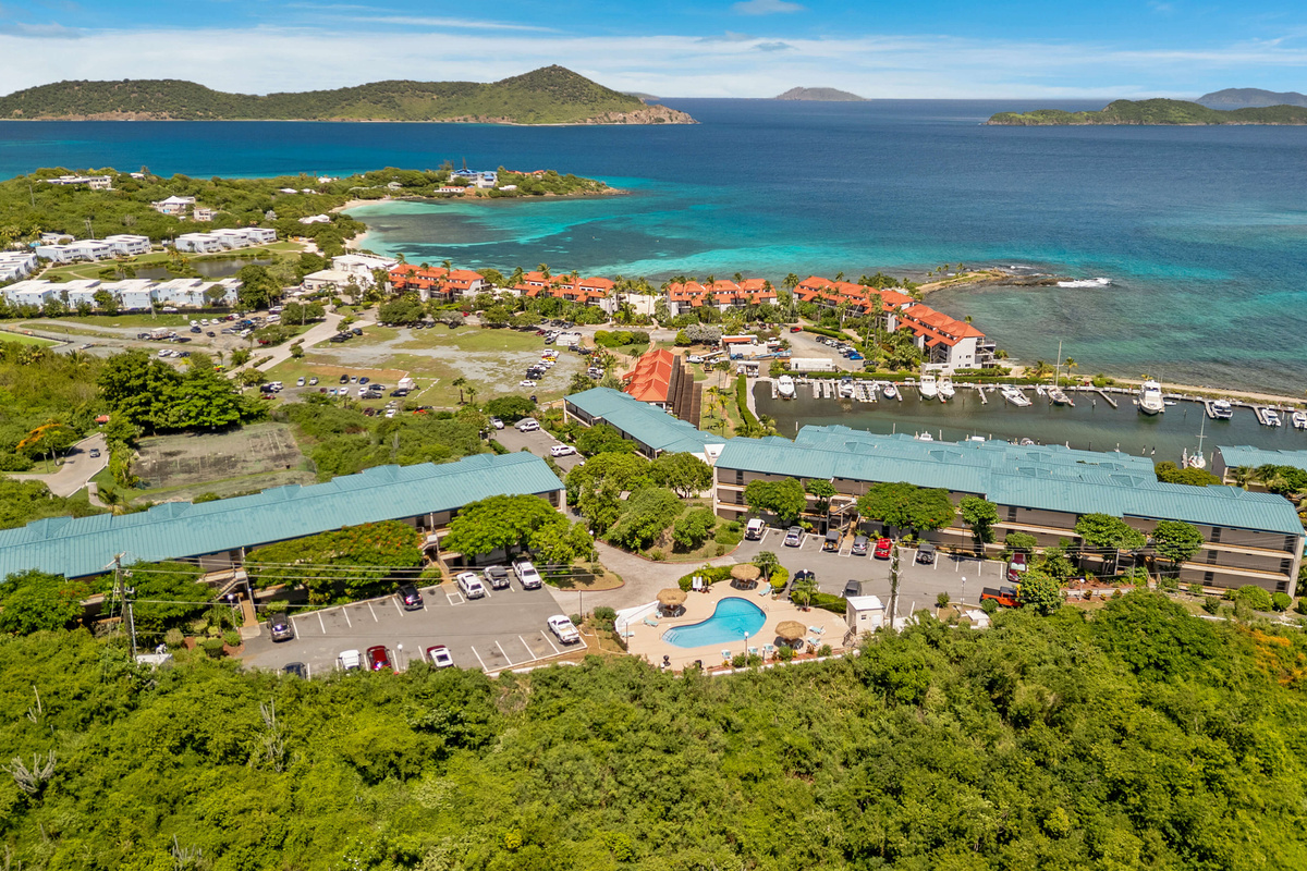 The St. Kitt's building is on the left and you can see the distance to Sapphire Beach. It's about a 10 minute walk downhill and 15