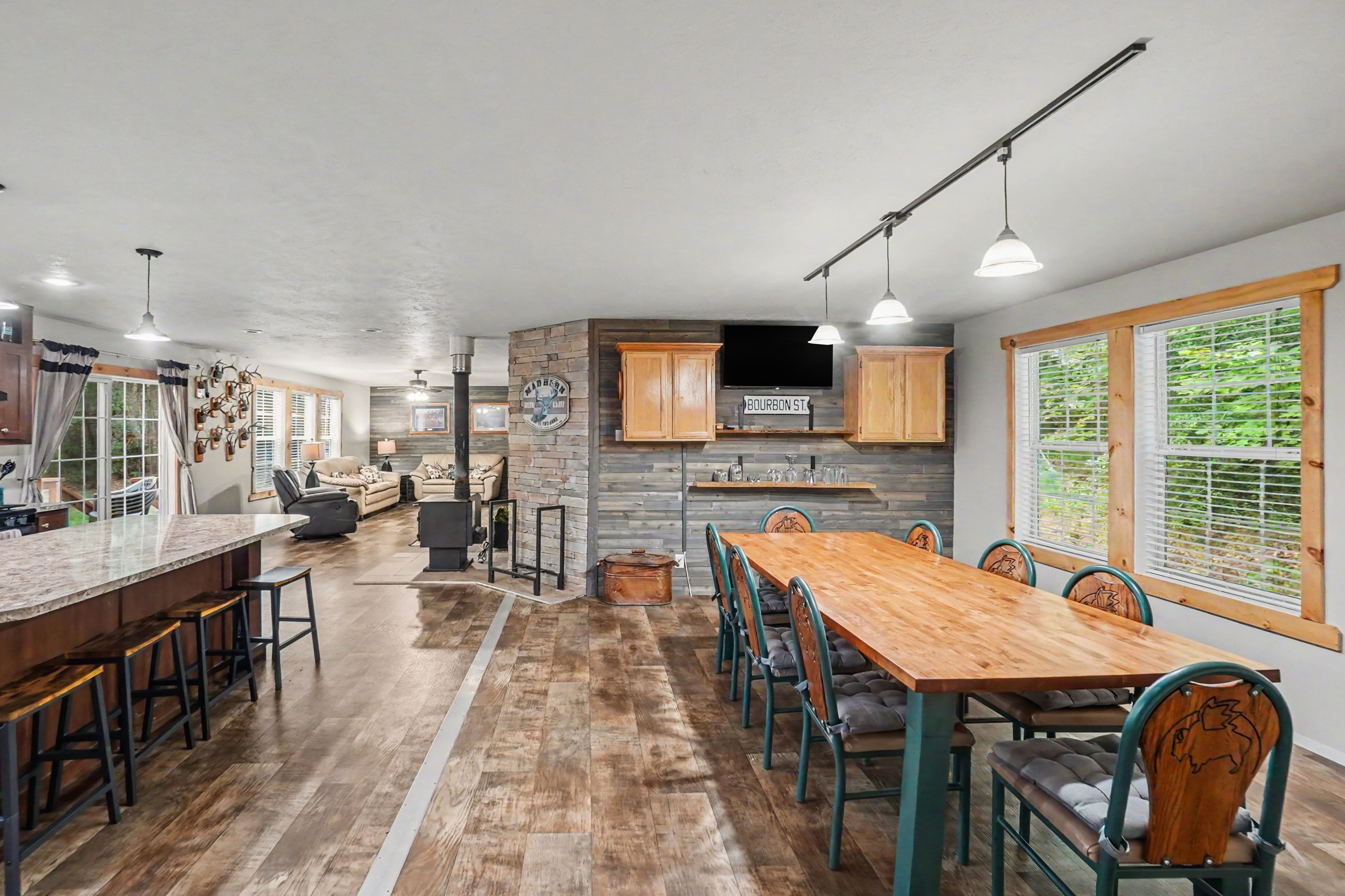 View of the dining room, living room and kitchen.