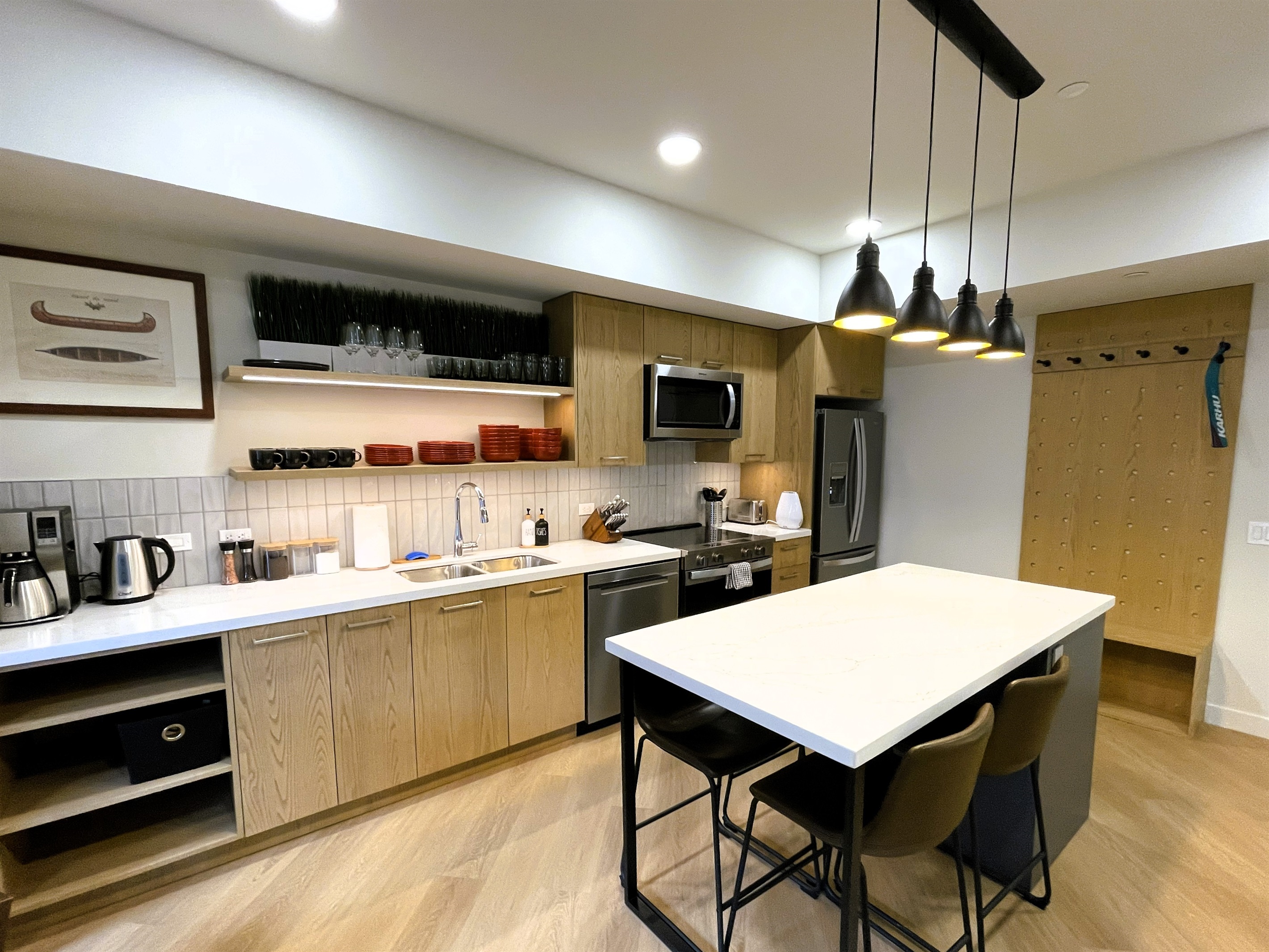 Comfortable seating for four by a granite breakfast bar centrally located in the kitchen area. High speed internet throughout the unit. 