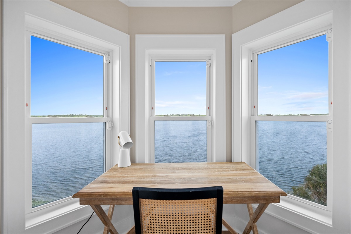 Dedicated workspace with unmatched panoramic water views&mdash;perfect for remote work with a view