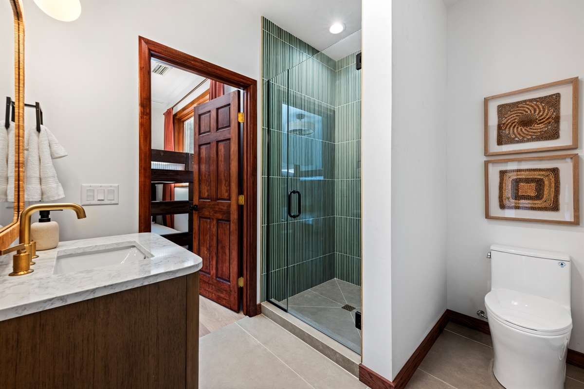 Bathroom 5:
Fresh, modern bathroom with walk-in shower and updated design.