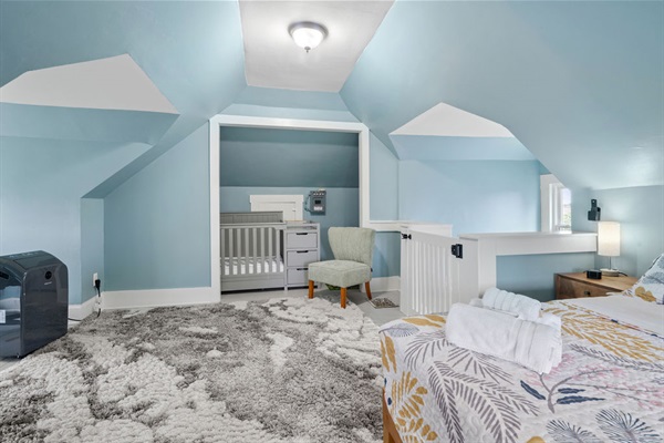 Upstairs Bedroom (top floor) has an oversized room with office desk and monitor screen, full bed, and a crib for those parents with littles.  We also have a pack and play at the house you can use if needed.
