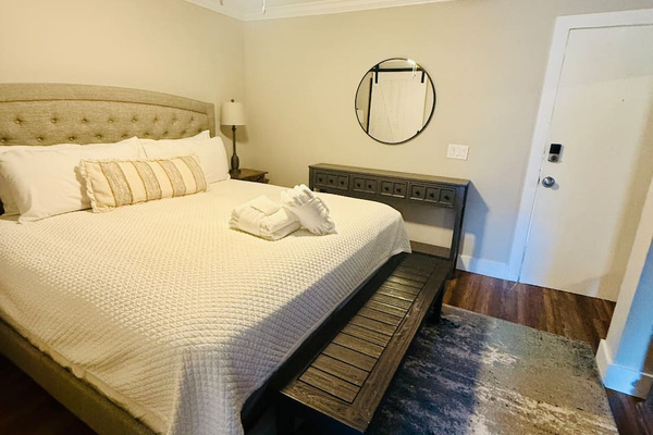 Bedroom with the villa entrance door