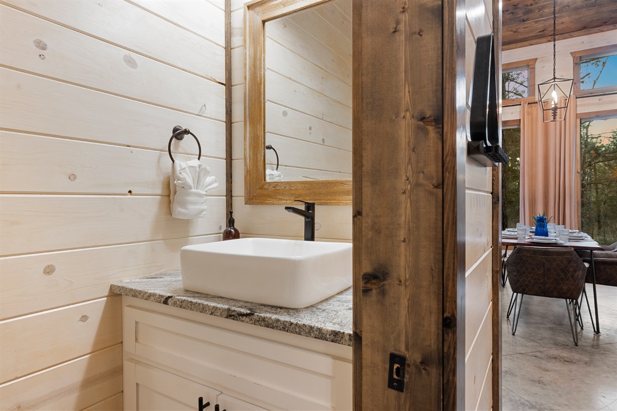 Every bedroom has its own full bathroom and there is also a convenient half bathroom near the living room.