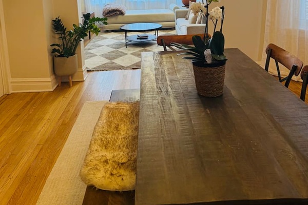 beautiful dining table perfect for group meals, game night, or planning your Chicago adventures.