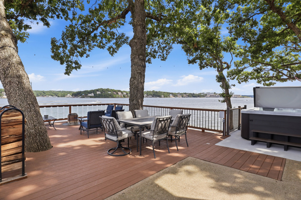 Relax in comfortable outdoor seating with lakefront views