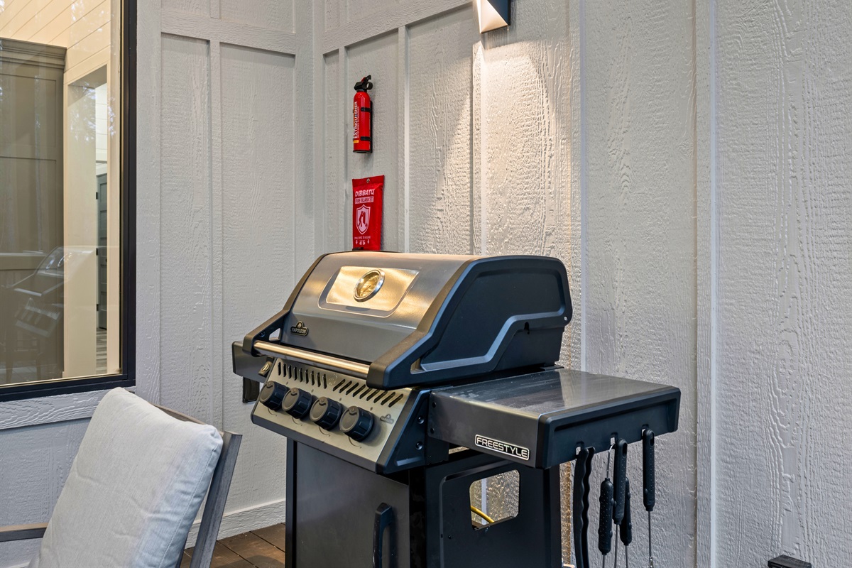 The grill station is ready for cookouts, making it simple to prepare your favorite meals while enjoying the outdoor space.