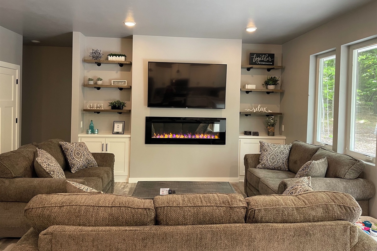 House 1 - living room with gas fireplace