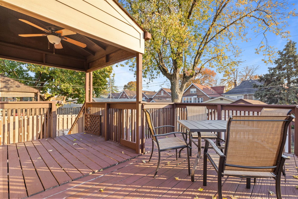 Outdoor deck with additional dining or lounging space for 4.