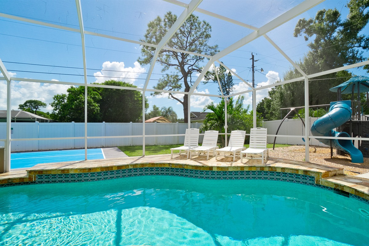 Enjoy the best of both worlds, a refreshing pool for lounging, cozy sunbeds for soaking up rays, and your own pickleball court for friendly competition