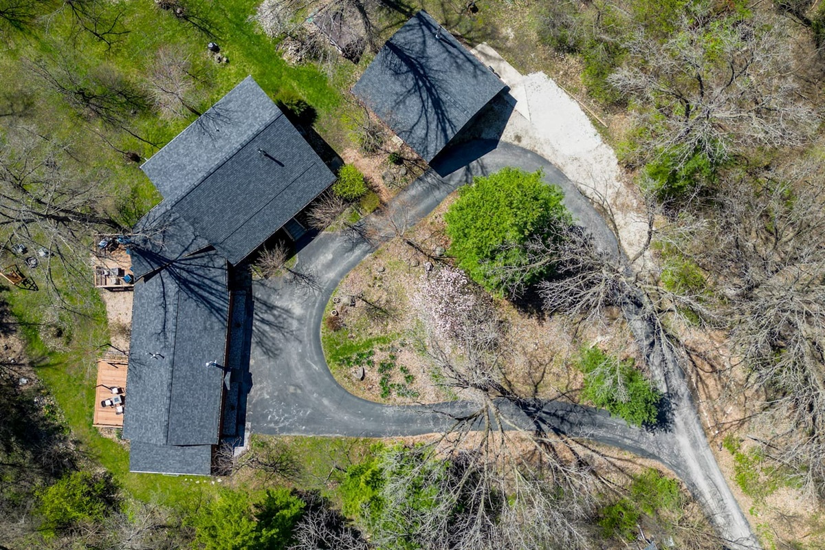 Circular drive - parking in front of Guest Quarters and in the gravel area off edge of driveway - provides space for 7 vehicles. There is no street parking.