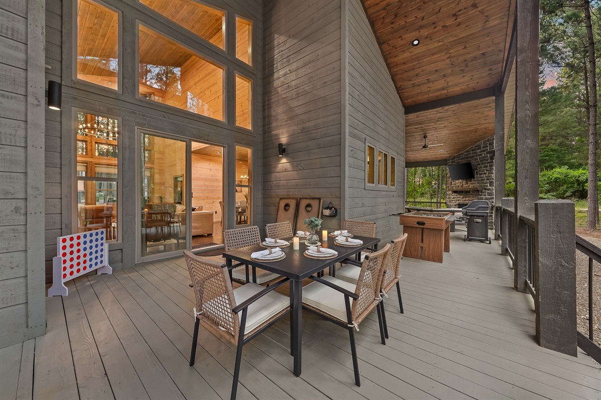 This cabin offers all the extra amenities indoors and on the large covered back deck.