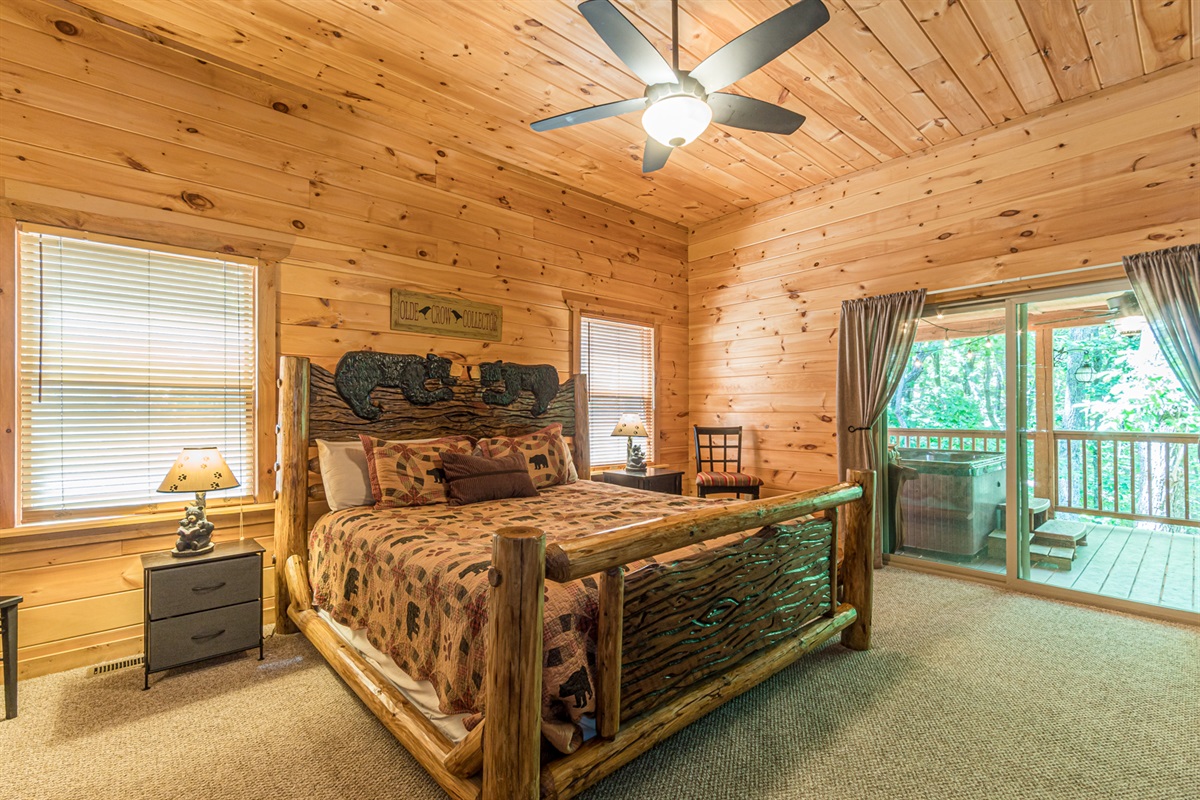 Queen Bear Log Bed in Master Walks right out to Hot Tub