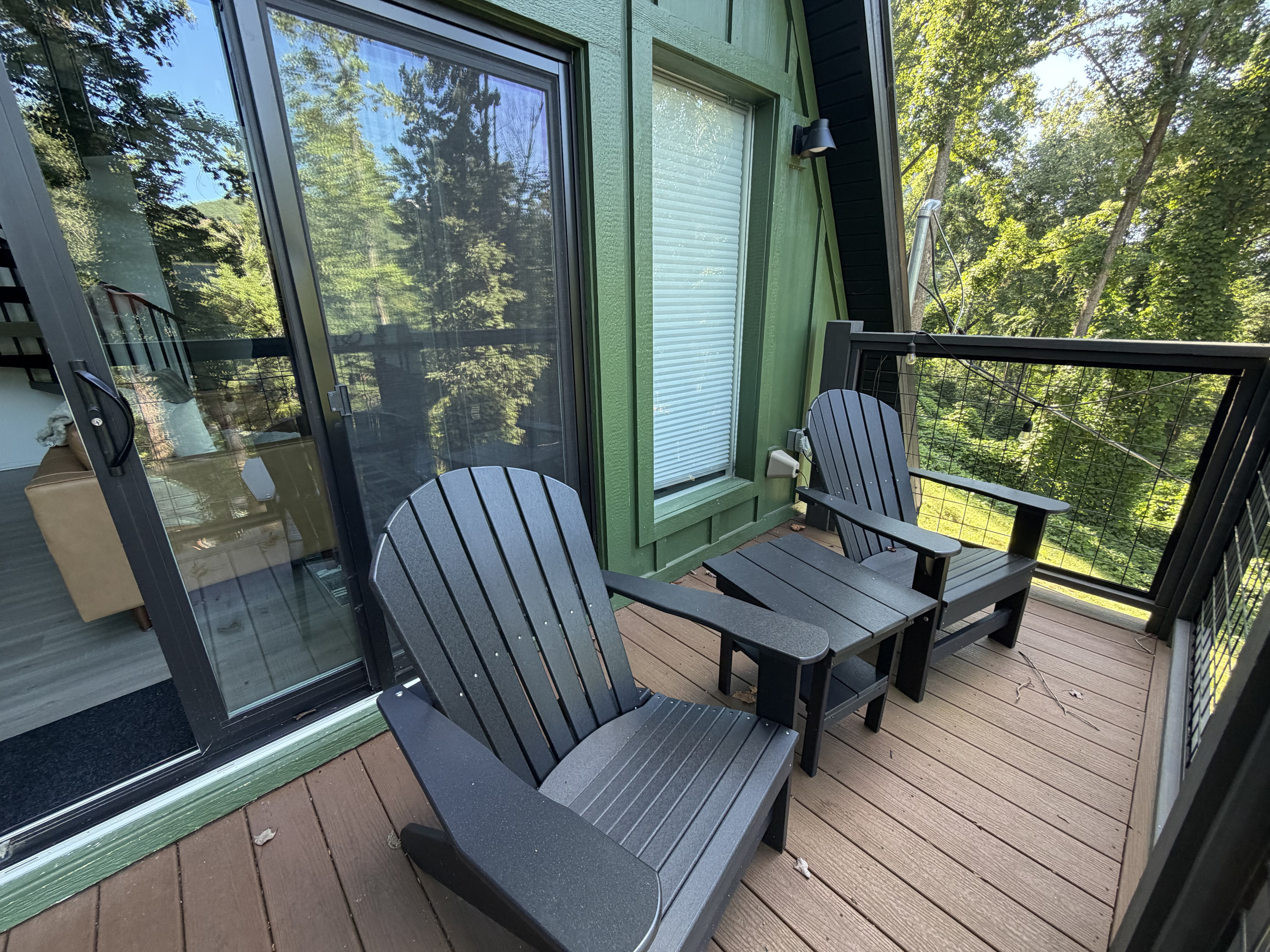 Sit out on the front Balcony in Adirondak chairs