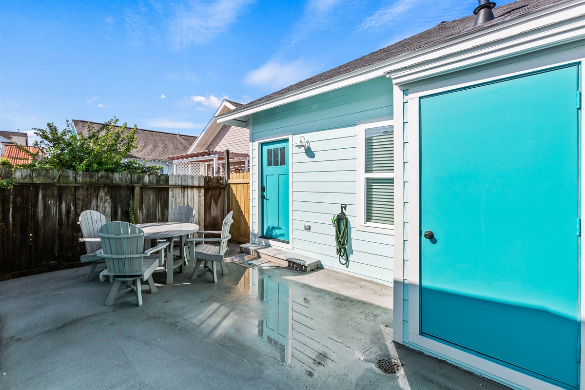 Private back yard with hose to rinse off sand after a day at the beach!