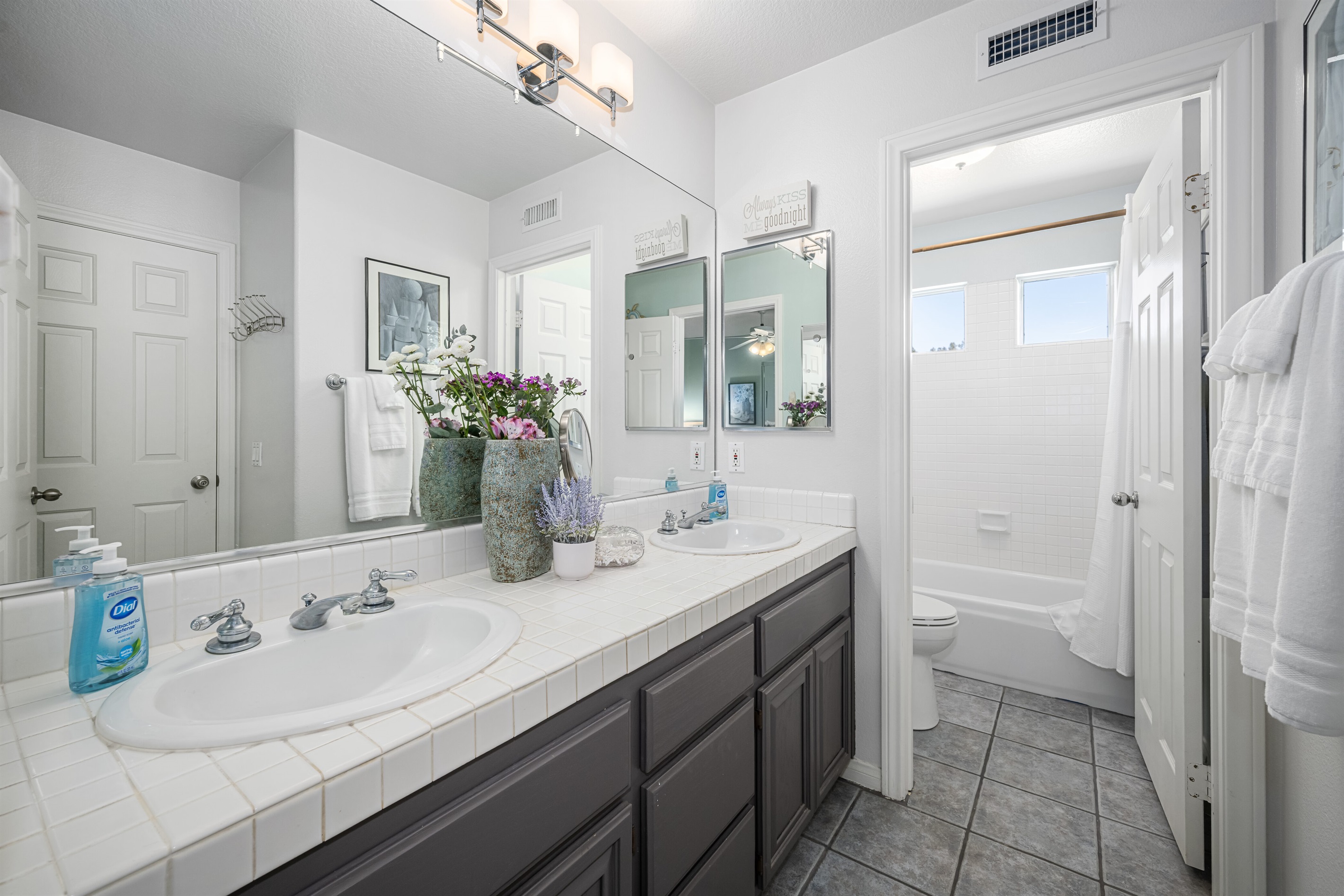 Ensuite bath to Front/Primary and Second/Hallway bedrooms