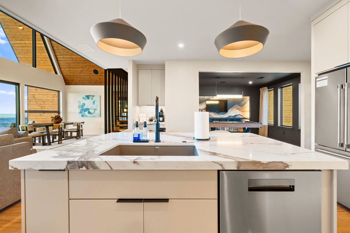 The oversized island is such a favorite hangout spot, with plenty of seating for coffee in the morning, casual lunches, or a late-night round of appetizers.