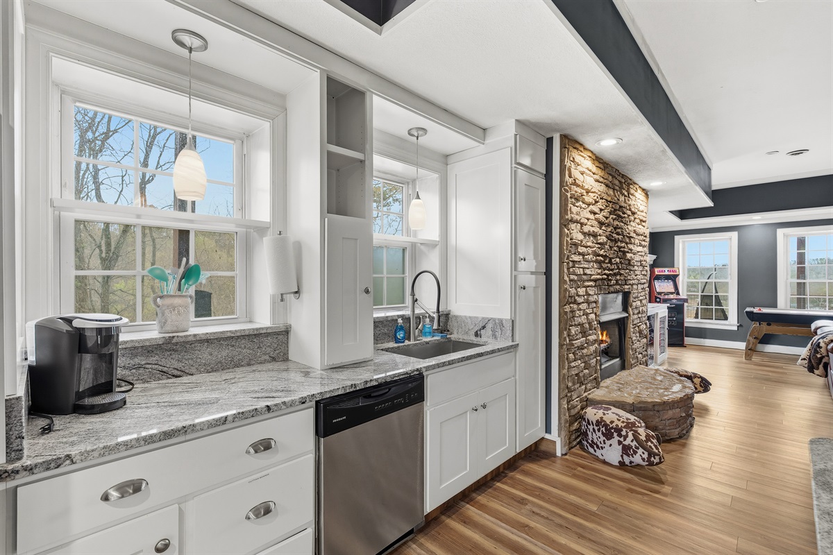 Second full kitchen next to entertainment space.