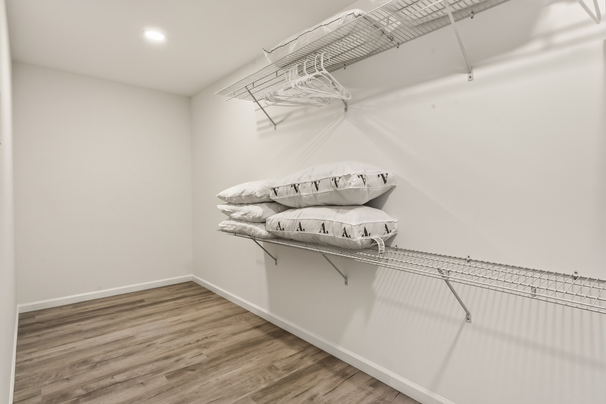 Walk-in closet with built-in shelving