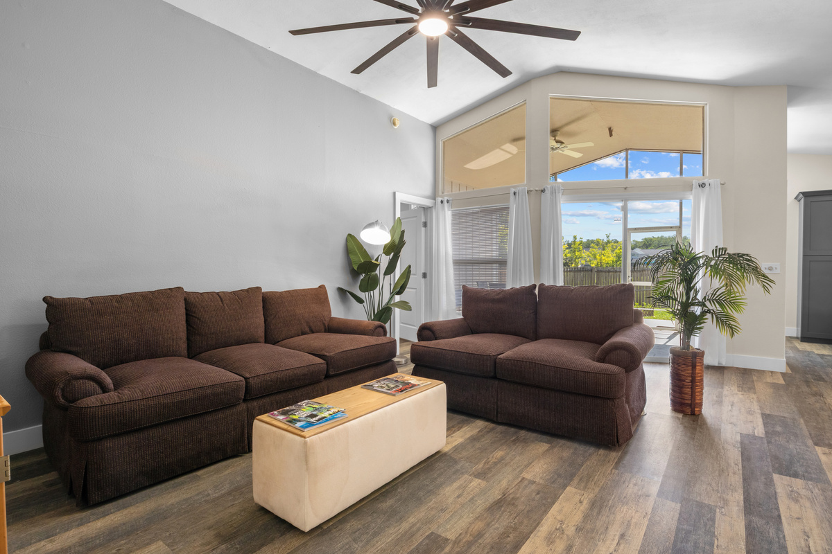 Family room. Large ceiling fan. Natural light.