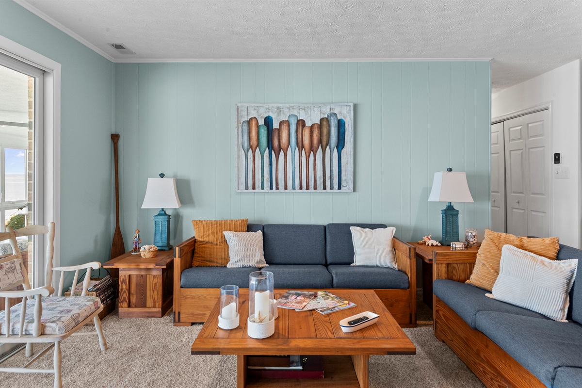 Living Room Retreat: Relax in style with vibrant decor and inviting views! Perfect for gatherings!