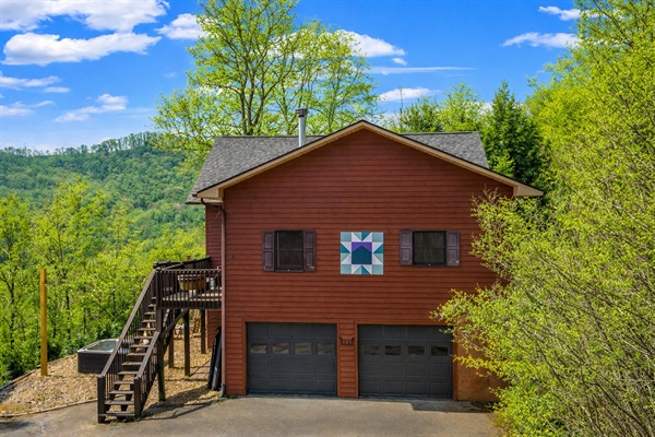  Aerial view showing the home, driveway, and stairs from the deck—easy access and a clear sense of the layout.