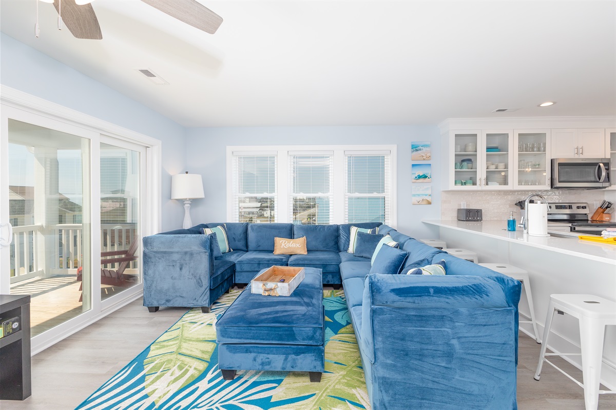 Cozy blue sectional with ocean views.