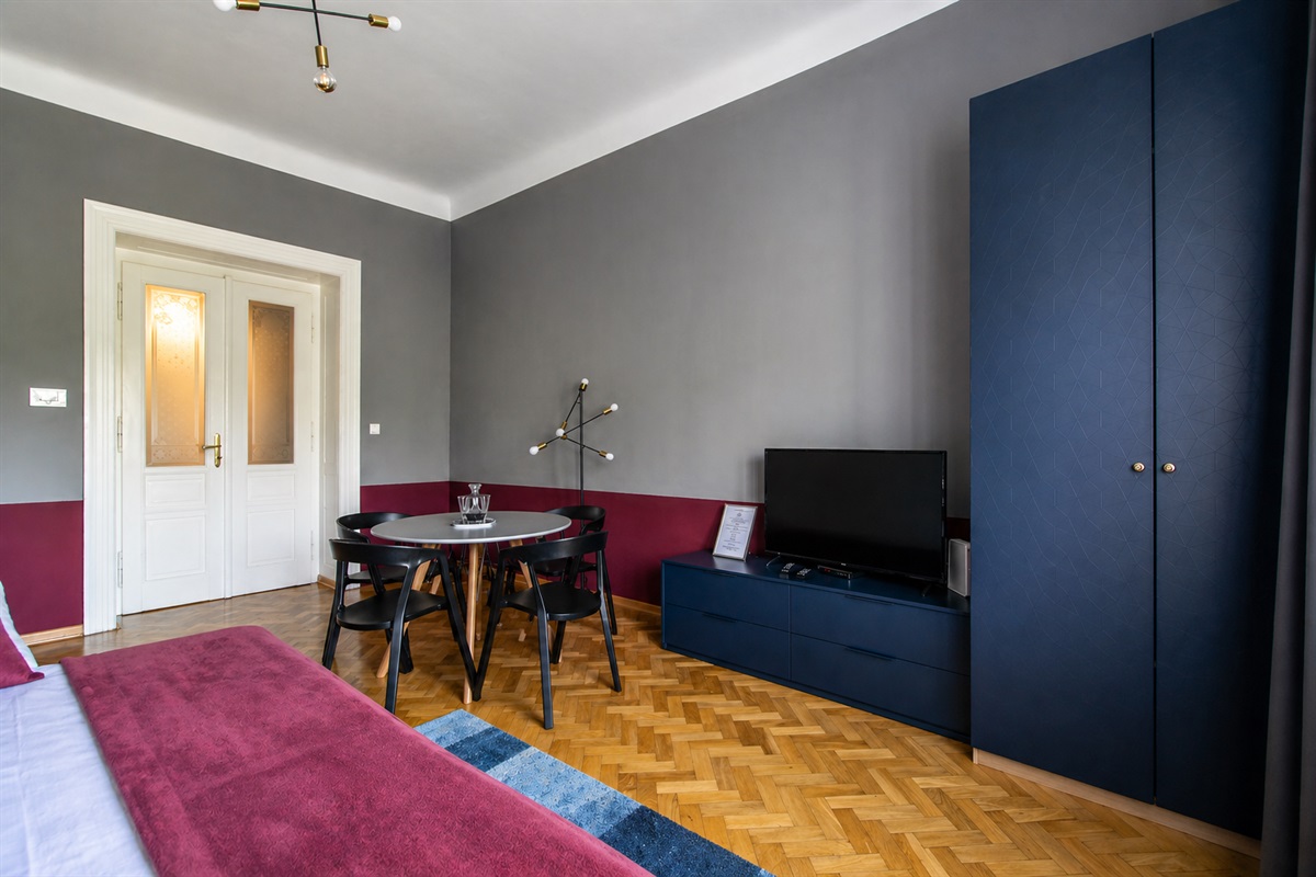 In apartment, there is a nice dining table for your to have a great breakfast or dinner