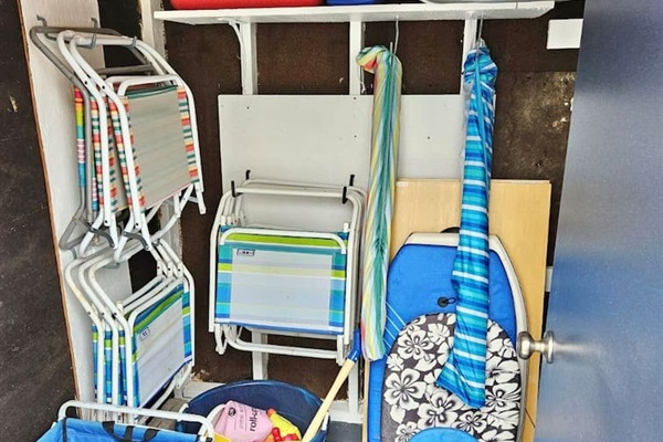 Save space in your car! We provide the essentials for a perfect day at the shore, including several folding beach chairs, beach umbrellas, a boogie board, and a handy cart to haul it all down to the sand.