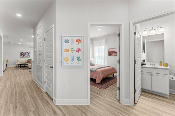 Spacious entryway leads to front bedrooms and hallway to living spaces