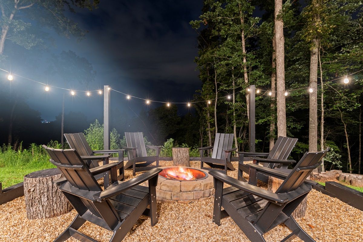 Roast s'mores and create everlasting memories by the fire pit under hanging lights.