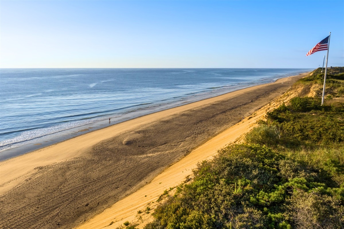 A quiet stretch of shoreline, where the dunes meet the sea.