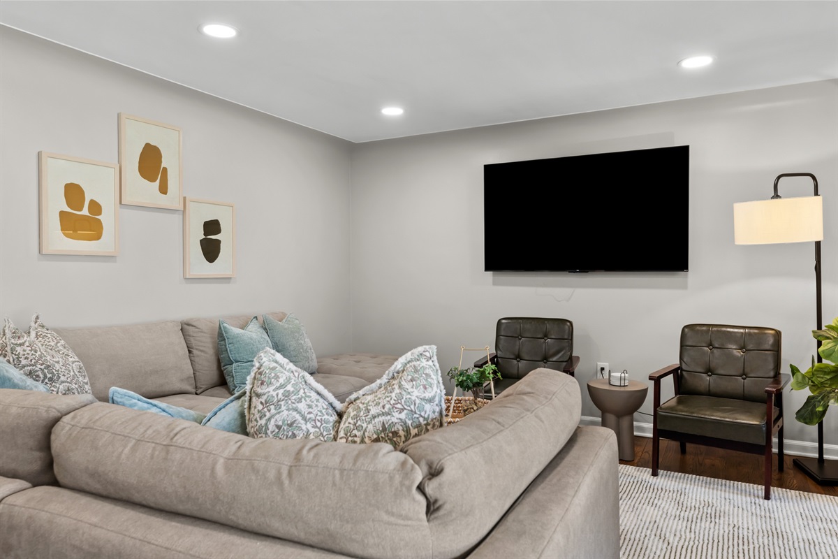 Relax on our comfortable couch & enjoy your favorite apps on our 50in Smart TV