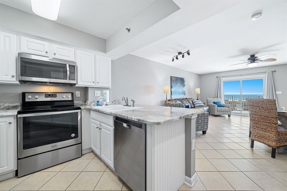 Bright and airy kitchen with ample counter space and modern amenities, creating an inviting space for cooking and gathering.