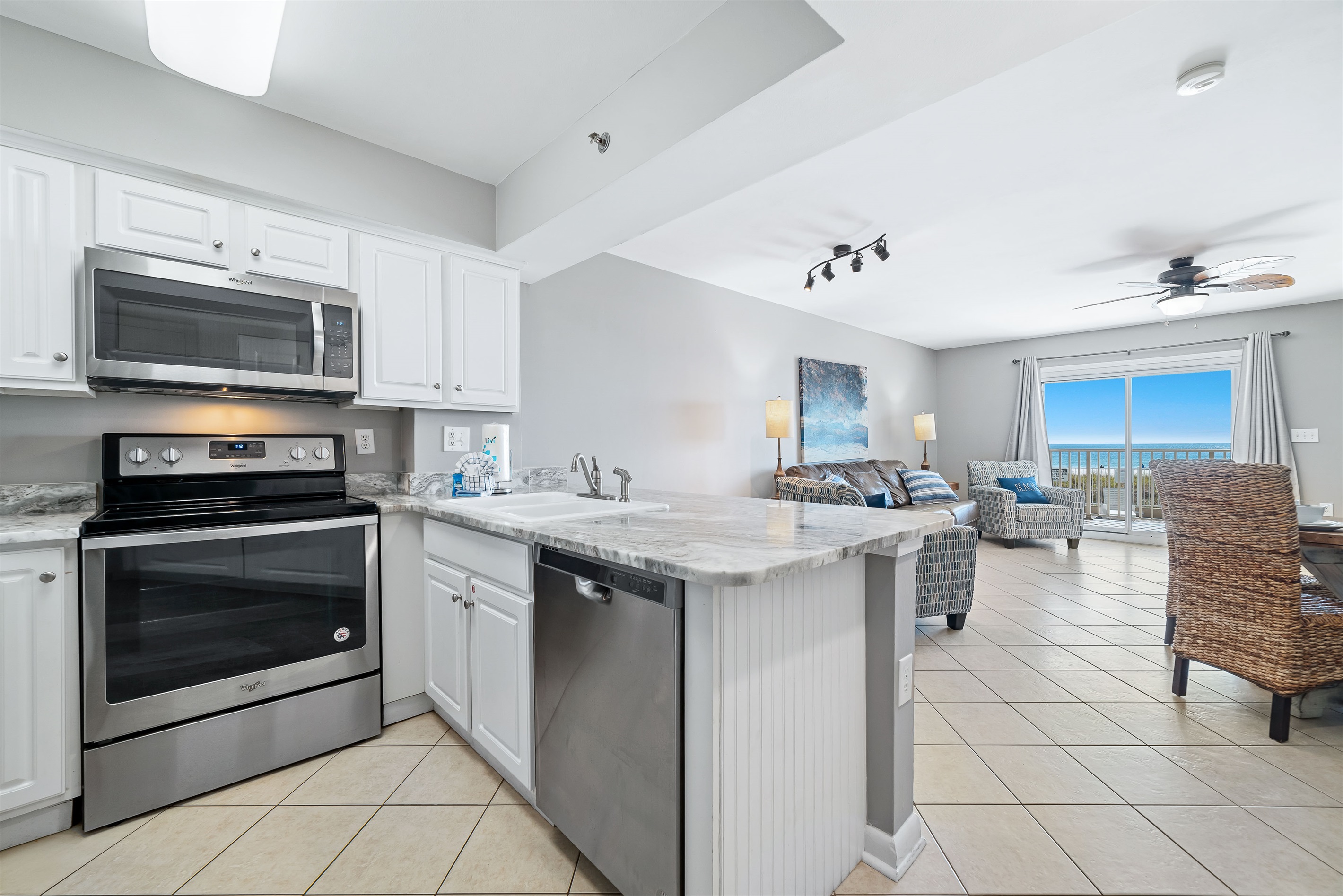 Bright and airy kitchen with ample counter space and modern amenities, creating an inviting space for cooking and gathering.