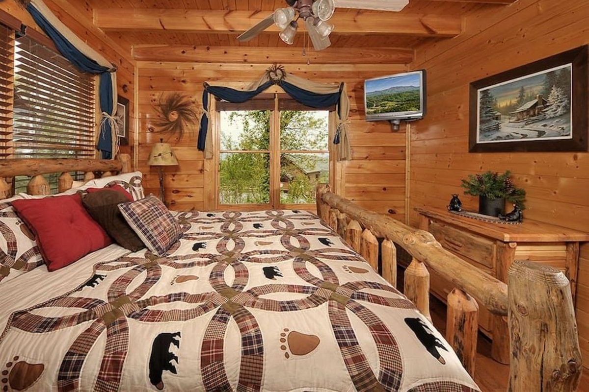 - Inviting log bedroom with mountain-inspired design and cozy warmth   - Watch the sunrise from bed or unwind with your favorite shows nearby   - Every detail designed for comfort and a perfect mountain night&rsquo;s sleep