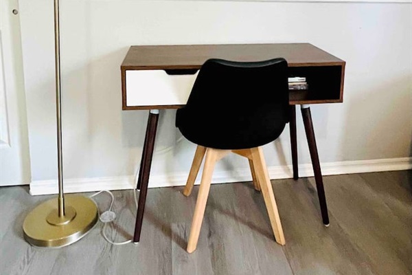 Designated work station with a small desk in the Master bedroom. 